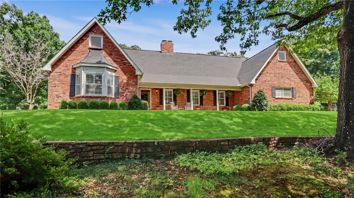 Offered for the first time in more than 30 years, this distinguished two-story residence is situated on nearly three acres and presents exceptional potential for a future pool, guest house, or possible development. The main level features formal living and dining rooms, a den with fireplace, a spacious eat-in kitchen, powder room, and a generous primary suite. The primary suite includes a large walk-in closet with two built-in chests of drawers. Upstairs offers three bedrooms, including one ensuite, each with spacious closets, plus an additional hall bathroom and extensive walk-in attic storage. Recent updates have been made to the kitchen and primary bath. With neutral paint, inviting living spaces, a garden area, and move-in ready condition, this property offers comfort, function, and an excellent opportunity for everyday living and entertaining.