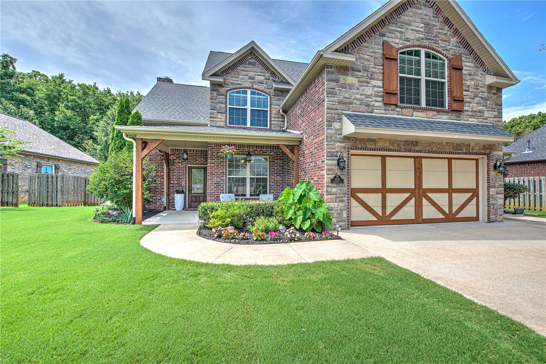 Welcome home to 1710 Partridge Run, a one family owned custom built home in Quailridge Subdivision, a Bentonville gem. This 3,024 square foot home offers 4 bedrooms, 3.5 baths, and thoughtful design at every turn.
The Main level features the primary suite, dining room, pantry, kitchen, eat in kitchen, Tall ceilings, custom hardwood doors throughout, and a laundry room that offers plenty of storage. Upstairs you’ll find 3 bedrooms, 2 full bathrooms, and a bonus room perfect for a game room/ media space, complete with its own walk in storage/office space.  Outside you will enjoy a private escape featuring a pool, a covered patio, and an area ideal for entertaining or quiet evenings at home. Some upgrades include central vac, wood burning FP in the LR, stonework, attic storage, and extended 3 car garage with work space, new roof in 2026, newer water heater, immaculate landscaping, and much more. The neighborhood clubhouse also offers a pool, b-ball court, playground, and kitchen/dining space. This one is a rare find!