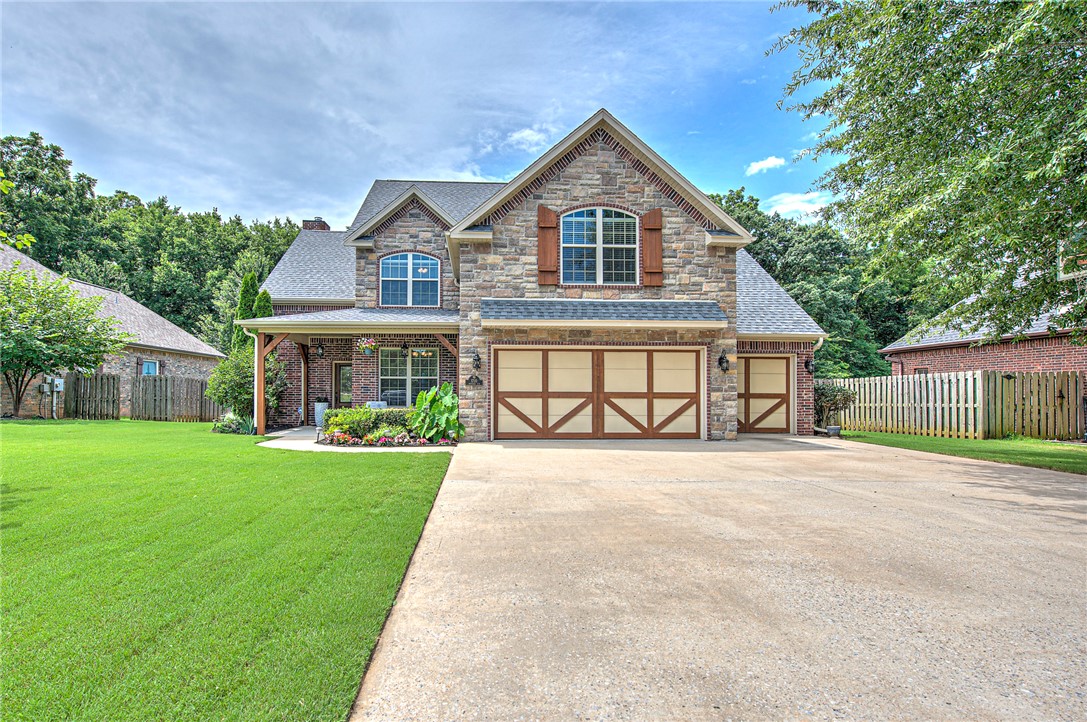 Welcome home to 1710 Partridge Run, a one family owned custom built home in Quailridge Subdivision, a Bentonville gem. This 3,024 square foot home offers 4 bedrooms, 3.5 baths, and thoughtful design at every turn.
The Main level features the primary suite, dining room, pantry, kitchen, eat in kitchen, Tall ceilings, custom hardwood doors throughout, and a laundry room that offers plenty of storage. Upstairs you’ll find 3 bedrooms, 2 full bathrooms, and a bonus room perfect for a game room/ media space, complete with its own walk in storage/office space.  Outside you will enjoy a private escape featuring a pool, a covered patio, and an area ideal for entertaining or quiet evenings at home. Some upgrades include central vac, wood burning FP in the LR, stonework, attic storage, and extended 3 car garage with work space, new roof in 2026, newer water heater, immaculate landscaping, and much more. The neighborhood clubhouse also offers a pool, b-ball court, playground, and kitchen/dining space. This one is a rare find!