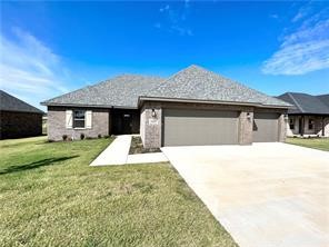 Conveniently located close to the Pea Ridge High School, trails, and only 15 minutes to downtown Bentonville. The "Mercer" plan features a wood privacy fence, 3BDs, 2.5BA's, pocket office, modern quartz counters, custom cabinets w/ wood hood above gas range, large island, covered patio, and a 3 car garage! Full sod + landscaping package. ***Pictures may not be of exact unit available***