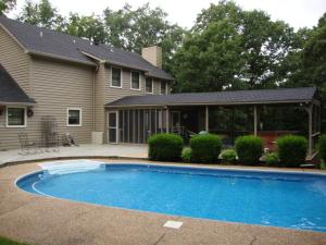 Sold before entering in MLS. 4BR 4BA house with heated pool, hot tub, gas generator, on a corner lot.