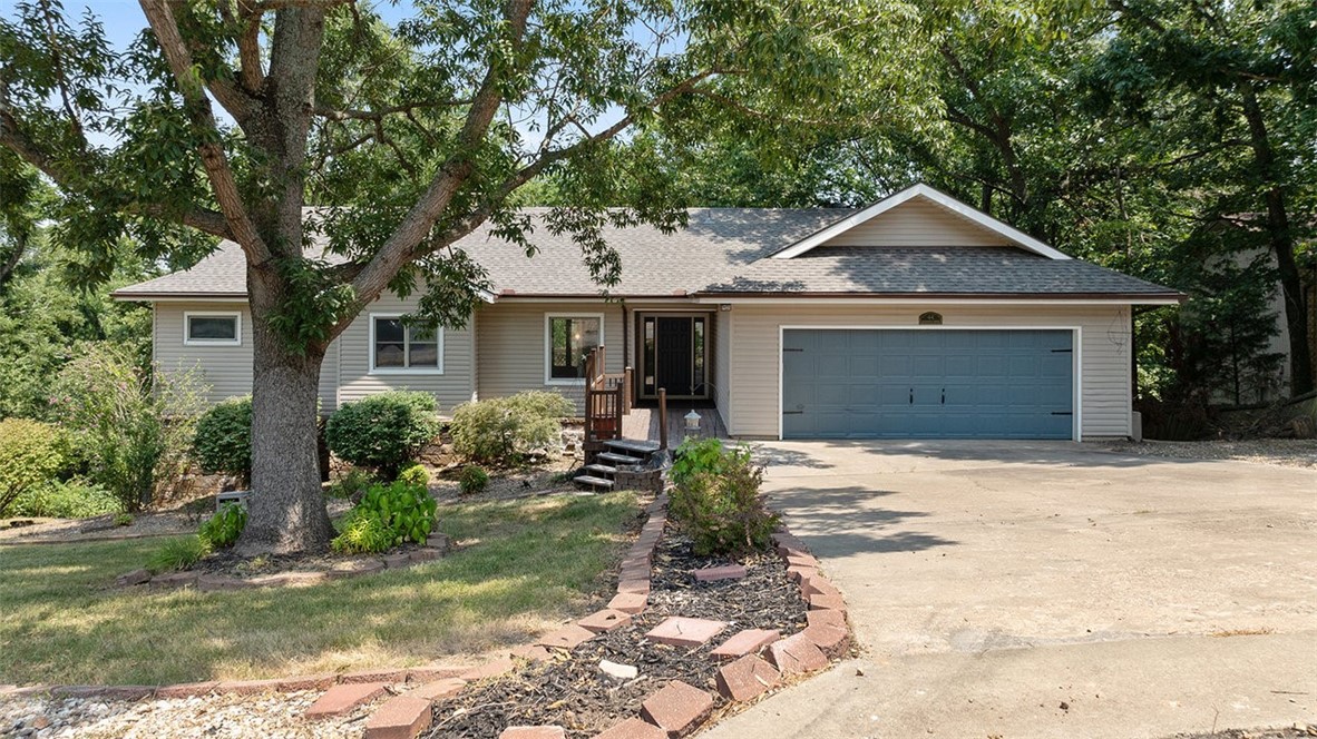 Packed with potential, this 3-bed, 3.5-bath Bella Vista ranch offers 2,678 sq ft of flexible living space on a beautifully landscaped half-acre lot. With two fireplaces, two living areas, and two decks, there's room to relax, entertain, and spread out. Recent updates include a brand-new roof, new lower-level HVAC, fresh paint, new tile, carpet, lighting, fixtures, and quartz and granite counters throughout. The lower level features two bonus spaces — one with outdoor access perfect for a workshop, gym, art studio, game room, or 4th bedroom. The smaller bonus room would make a lovely office or theater room. There's even short-term rental potential. A two-car garage and finished basement, round out this incredibly versatile home. Community amenities include a clubhouse, tennis courts, and playground, all just minutes from Loch Lomond marina, the K-9 park, and Scottsdale Golf Course. Come see everything this home has to offer!