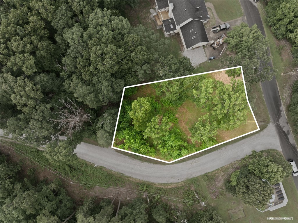 Build your dream home on this beautiful homesite in the desirable Berkshire Subdivision of Bella Vista Village! Lot 54, Block 5 offers an excellent building site just minutes from Lake Ann. The property has already been surveyed and perc tested, with public water and electric available, making it even easier to begin planning your new home. Located in the highly sought-after Bentonville School District, this lot offers the perfect blend of peaceful natural surroundings and convenient access to everything Northwest Arkansas has to offer. Whether you're ready to build your forever home or invest for the future, this is an opportunity you won't want to miss.