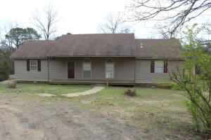 Get away without going away in this lovely country home with big features and Piney Creek access.  The spacious home offers 4 bedrooms, 2 baths, lovely wood floors, a pretty sunroom with a cozy pellet stove and relaxing hot tub!  The home is set on 1.82 scenic acres giving you plenty of room to enjoy the outdoors and there is a great shop/storage building!