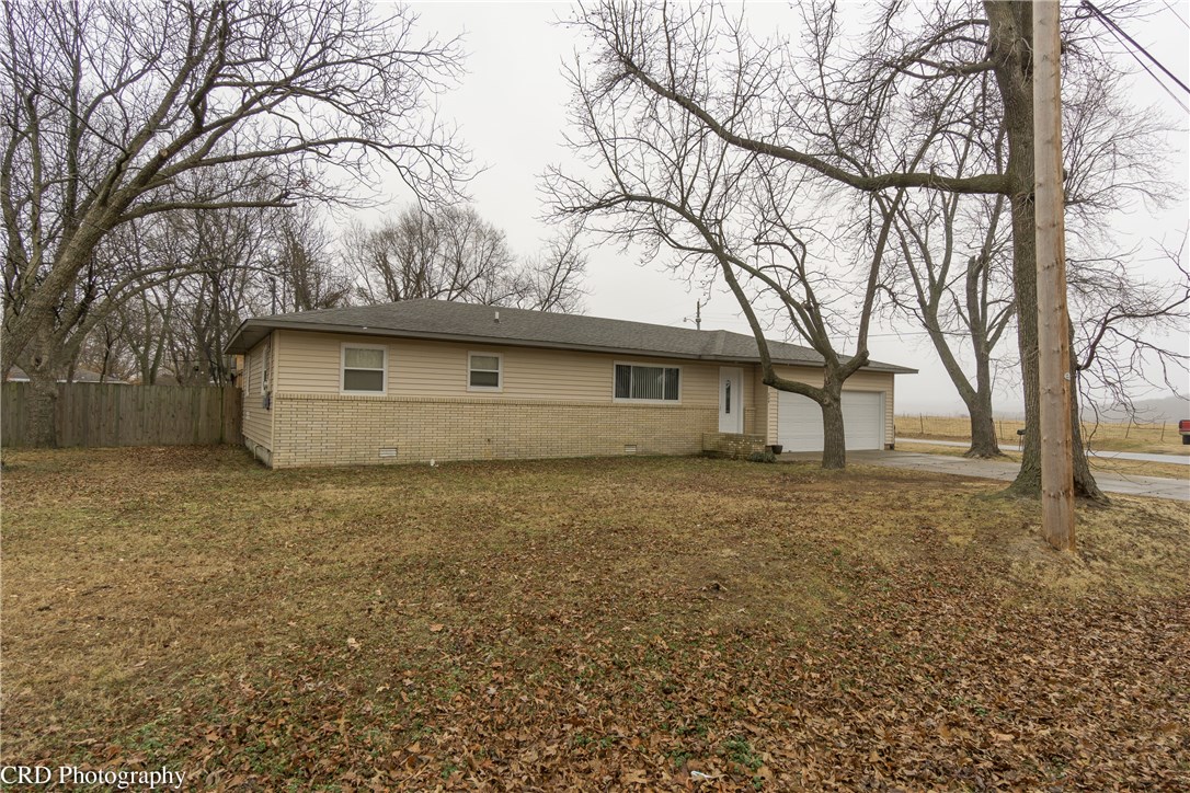 Beautiful restoration of this lovely 3/2/2 including all new sheetrock, plumbing, electrical & paint.  Custom tumbled marble front gas log FP w/ hand built mantle & Hearth.  Gleaming hardwood flooring, new tile, no carpet.  Gorgeous kitchen w/new cabinetry, SS Appliances, granite + large island. All of this located on a quiet street on a large .37 acre lot with new privacy fencing and fresh exterior trim paint.  You will be so proud to call this your new home.