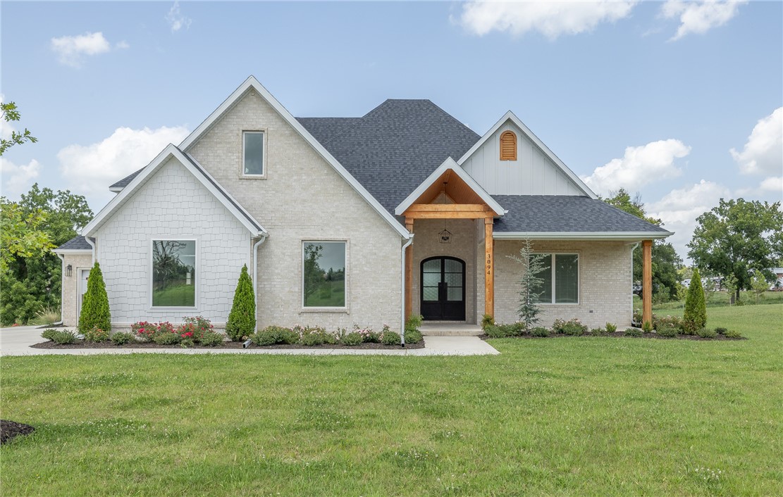 Absolutely stunning new construction home in Tontitown’s newest Deer Valley S/D!! 3,632 heated and cooled sq ft includes 4 bedrooms (of which 3 are on the main level), 3 full and 1 half bathrooms, open eat in kitchen to oversized living room, dining room, study/office, pantry, bonus room, laundry, and mudd room. Amenities are in abundance and include wide plank white oak hardwood floors, vaulted ceilings, beautiful floor-to-ceiling stone surround fireplace, waterfall quartz island, soft close cabinet doors and drawers,  6 burner 48" gas range, built in professional series refrigerator, designer tile selections even in the tub surrounds, 2” blinds on all windows, mudd room lockers, attic storage, sprinkler system, covered patio with a fireplace and a 3 car garage! This fantastic home is situated on 1.37 acres and is zoned for Har-Ber High School!!  MOVE IN READY!!!