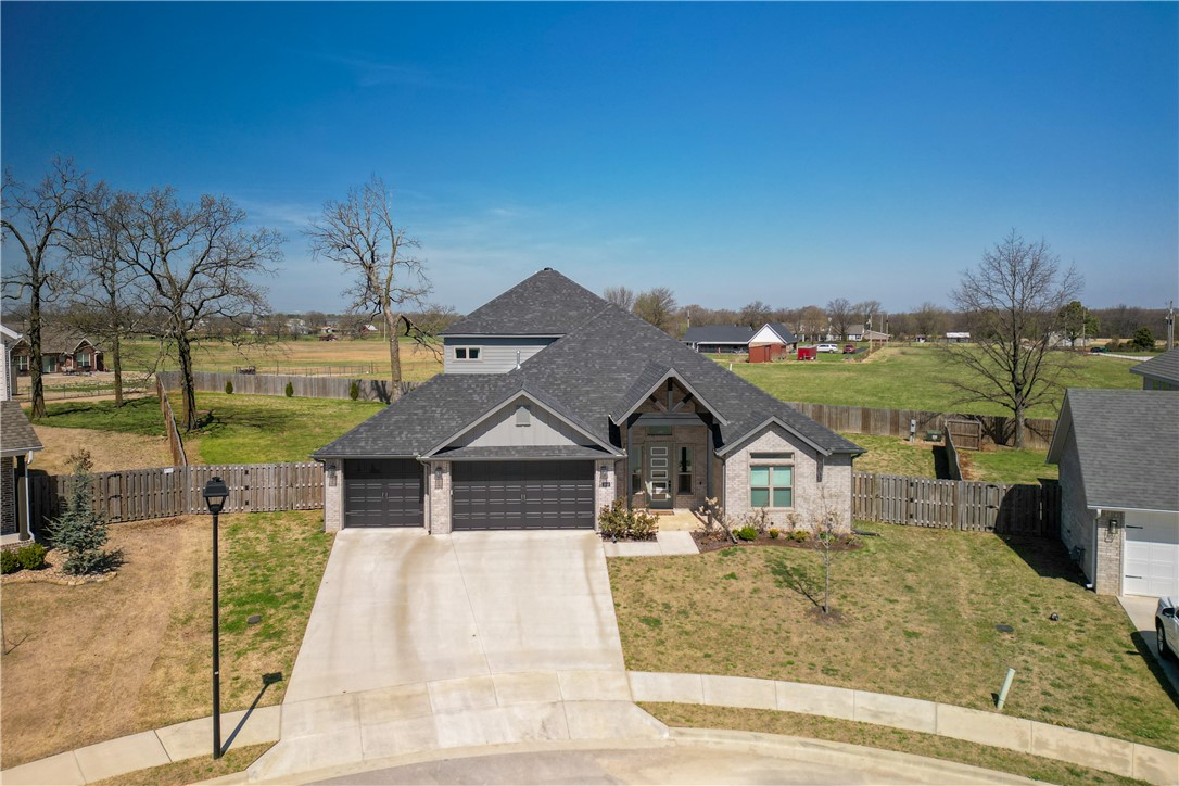 Nestled in a beautifully landscaped subdivision within Springdale city limits, this stunning 2023-built 4-bed, 3.5-bath home checks every box. Just minutes from a park and all the shopping, dining, and conveniences of NW Arkansas, the location truly can't be beat.
Step inside and fall in love with the open floor plan. The chef's kitchen is loaded with upgrades — granite countertops, painted cabinets to the ceiling, a gas cooktop, double oven, and pantry. The primary suite is a true retreat, complete with a spacious walk-in closet. Upstairs, you'll find two additional bedrooms, a full bath, a spacious bonus room, and a half bath — offering flexible space for family, guests, or a home office.
Outside, the massive backyard offers endless space for play, gardening, or future outdoor living. Unwind on the covered patio with your morning coffee or host friends and family in style — all in a home that still looks and feels like the day it was built.