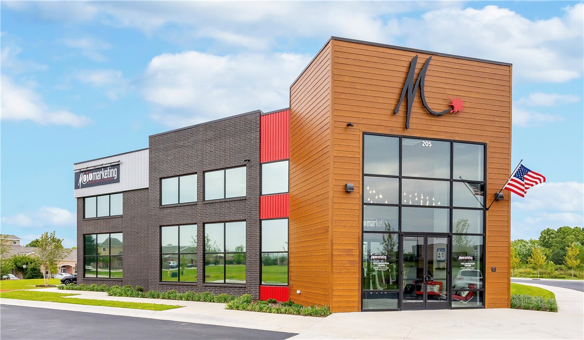 This one-of-a-kind 10,701 SF commercial property (7372 sf office, 3329 sf warehouse)—is more than just a building. It’s a launchpad for brands, creatives, and retail visionaries. Designed for teams who turn strategy into action, the space includes 7 private offices, 4 restrooms, an IT room, fixture room, warehouse, laundry, supply room, and a private lactation suite. The open balcony and game room area add a dynamic touch, perfect for fostering team culture and collaboration. Whether you're building campaigns, rolling out product launches, or creating retail experiences, this property was made to support high-impact work from concept to completion. Set in a prime Bentonville location, it’s the ideal HQ for companies that don’t settle for average. Ample parking, flexible workspace zones, and a layout built to scale with your business make this a rare opportunity for teams who blend creativity with execution. Don't miss this opportunity to make this your ideal work space!