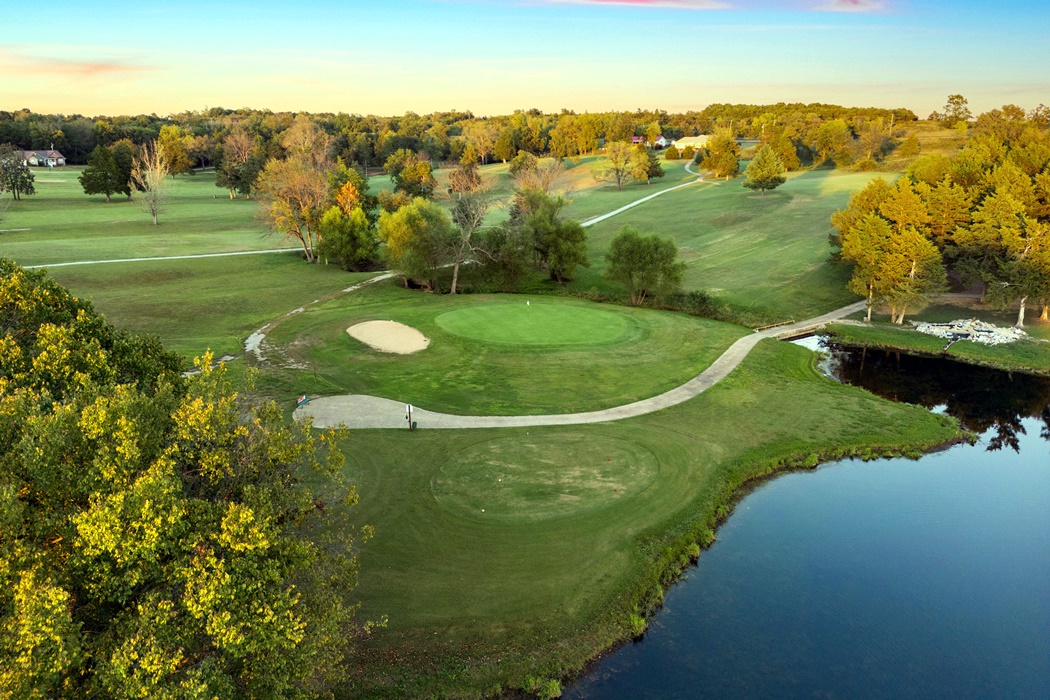 Located just 2 miles from Bull Shoals Lake in Diamond City, Arkansas, Diamond Hills Country Club offers an exceptional opportunity to own a 159-acre property featuring an 18-hole, Par 71 golf course with Bent Grass greens and Bermuda fairways. The course is set against the scenic backdrop of the Ozark Mountains, providing a challenging yet enjoyable experience for golfers of all levels. The property also includes 12 City lots and a driving range, perfect for practice or warm-ups before hitting the course. Additionally, the Bunker Bar & Grill offers indoor and outdoor dining, ideal for hosting events or providing a space for guests to unwind after a round of golf. This is a unique opportunity to own a well-established golf course, driving range, and restaurant in a peaceful, sought-after location near Bull Shoals Lake. Diamond Hills is the perfect opportunity for those seeking a recreational retreat or investment in one of Arkansas' most serene and charming locations