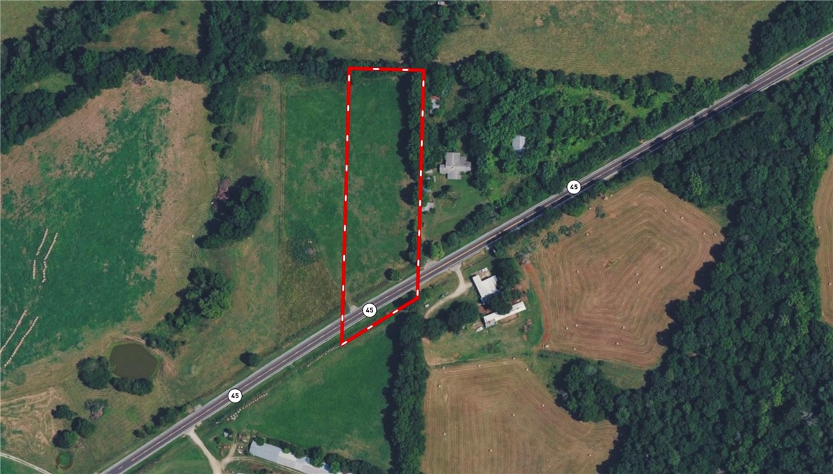 Do you want to live in the country but also want easy access to Fayetteville? Build your dream home on this beautiful 3.02 acres with a Fayetteville, Arkansas address! Located right off Highway 45, this property provides easy commute to Fayetteville, is only 15 minutes from grocery stores, and is 4 minutes from Goshen. With utilities at the street and a successful perc test in 2025, on this acreage, there is plenty of room for creating your homestead or hobby-farm. A wonderful level build site, cleared pasture, and no restrictions makes this a great place to build your home. This property is also available for subdivision. See MLS# 134443