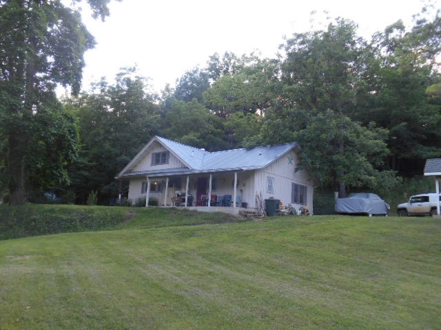 Secluded property with year round creek, 5 ponds, hay meadows, food plots, year round spring and abundant wildlife including elk and black bears.   Property has a large garden area, small vineyard and fruit trees.   Property has a walk in cooler, smoke house, shop, hay barn and storage buildings.   You have to see this property to see what all it offers.