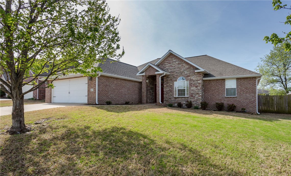 Beautiful home with new carpet and new paint.  Many extra features.  Master Suite has sitting area.  Master Bath has whirlpool tub and separate shower.  Includes Eat in Kitchen and Formal Dining Room.  
Under counter lighting in kitchen, backsplash Old World Style, granite countertops and quality cabinets.  Covered Patio with line for gas grill to hook up.  Wired for surround sound.  Flip a switch and the gas log fire comes on.  Flip switch in closet and Christmas Lights come on.  Located near Siloam Springs new park on Lake Francis.  Agent Owned.