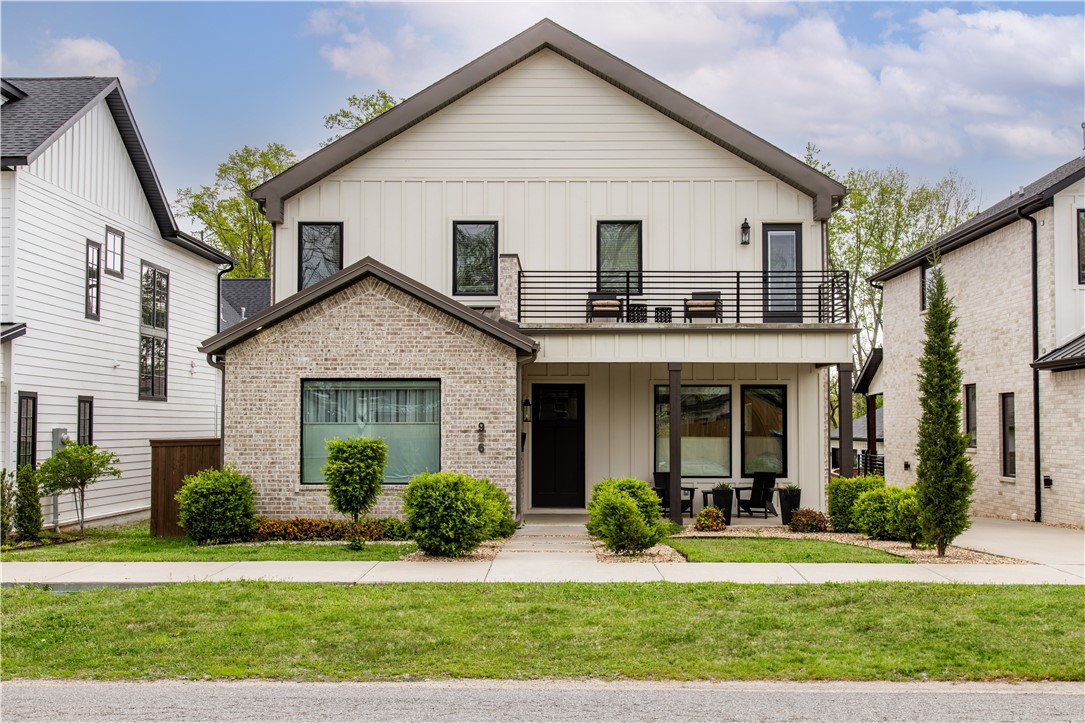 Welcome to modern living in the heart of Downtown Bentonville! This beautifully appointed home features wide-plank hardwood floors, designer lighting, oversized windows with custom coverings, and an open-concept layout perfect for entertaining. The kitchen shines with quartz countertops and a spacious layout, plus a cozy coffee bar nearby. The main-level suite offers a peaceful retreat, while upstairs includes a second living area and a private balcony—ideal for morning coffee. Enjoy the rare benefit of a 3-car garage and a quieter location on Main Street, just 2.5 blocks to Airship Coffee and under a mile to the Downtown Square, Crystal Bridges, and Slaughter Pen Trail. Park Springs Park, the Farmer’s Market, shops, and restaurants are all a short walk or bike ride away. Energy-efficient features and thoughtful design throughout make this home a standout in one of Bentonville’s most desirable areas.
