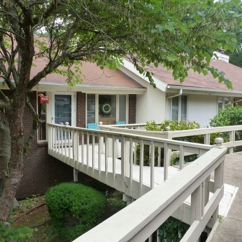 MOVE IN READY!   INVESTORS TAKE NOTE! 3 bedrooms PLUS an office. END UNIT.   Well cared for.  This townhome has great space. Lots of storage in the utility room.  All the appliances convey. Front porch PLUS 2 patio/decks, one up, one down. Very wide stairs, open To the living area.
2 CAR COVERED CARPORT. Nice and private setting and looking out the back.