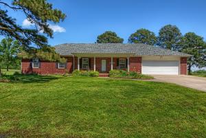 Gorgeous home on the 6th fairway of the Lions Dens Golf Course! Excellent condition! This recently remodeled home features 4 bedrooms, 2 baths and 2100 sq ft of total perfection. With a new roof, newly installed honed granite and handmade Italian tile back-splash, this home is a showstopper! Relax in your half acre yard and watch a game of golf or grab your clubs and have some fun. Large over-sized garage with room for your golf cart! Cathedral ceilings in the living room, formal and casual dining, breakfast bar, new lighting and fixtures, walk in closets and more!