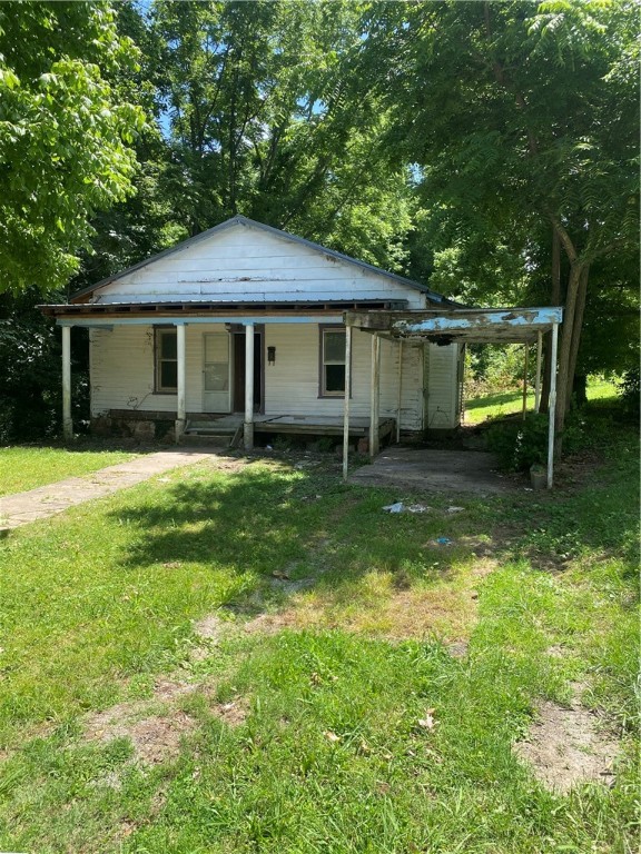 Investor Special!  New metal roof ~2mo old and spared no expense with new framing and decking underneath.  Full demo already completed down to the studs through the whole house, and ready for you to come finish to your liking.  Come take advantage of an amazing investment opportunity right in the heart of downtown Harrison!  Being sold as-is.