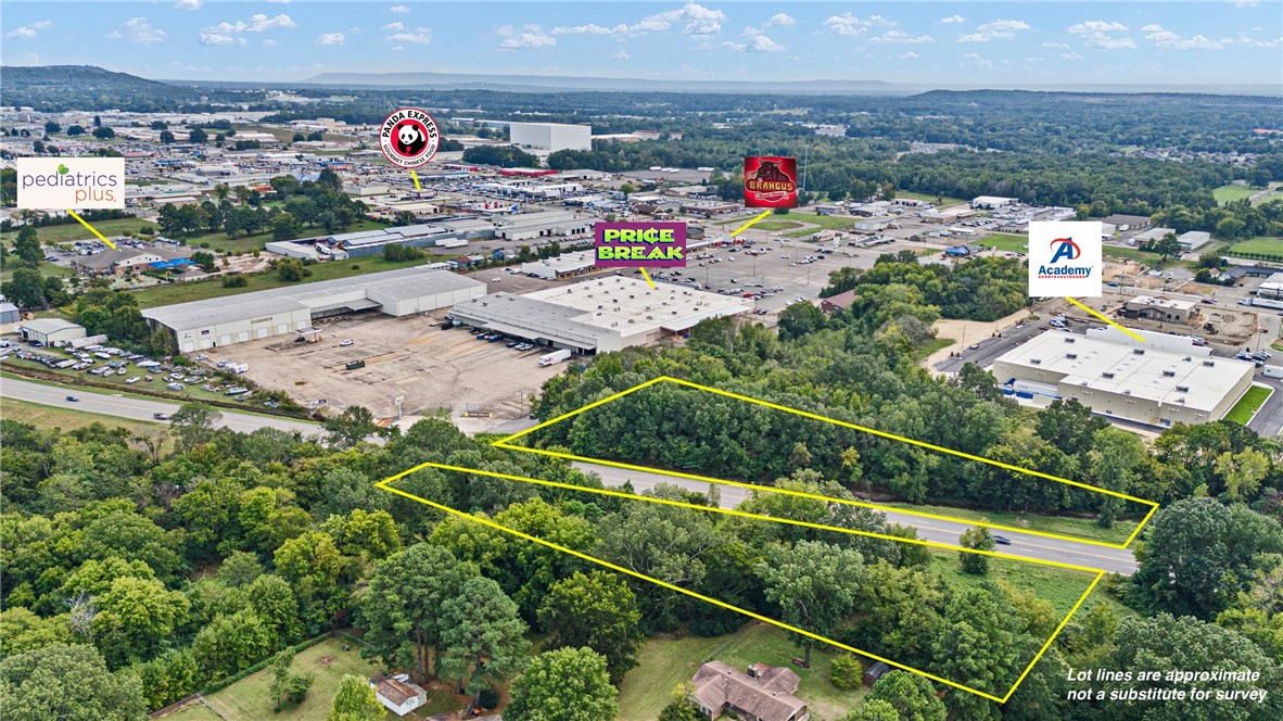High-traffic commercial property with prime Parkway frontage—over 10,000 cars per day! Two tracts totaling nearly 4 acres, including a 2.02-acre tract directly behind Academy Sports + Outdoors. Zoned C2 and ready for a buyer with vision! Portions lie in the floodzone and floodplain, with roughly 1/3 acre outside of both. Great visibility, strong location, and endless potential for development. All offers due by 11.7.25—contact Listing Agent for submission requirements and confirm permitted uses with Russellville Public Works.
