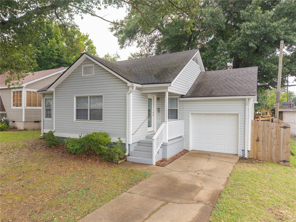 Okay, you have to see this one! This super cute 2-bedroom in Fort Smith is the real deal. It's in the England subdivision, close to schools and shopping, and the whole place has basically been redone — new appliances, new flooring, new plumbing, even a brand-new fence out back. It's small and cozy at 843 square feet, but it doesn't feel cramped thanks to the split floor plan and good-sized walk-in closets. There's an attached garage, a sweet covered front porch with this huge shade tree out front (perfect for morning coffee), and central heat and air so you're comfortable no matter the season. The best part? It's t ready for someone to move in right away — no waiting around. If you've been looking for a low-maintenance home that's already had the hard work done for you, this might be it!