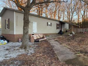 This three bedroom one bath mobile home sits on 1.75 ac m/l. The mobile does need some work but would make a great property! This would also be a great rental investment.
