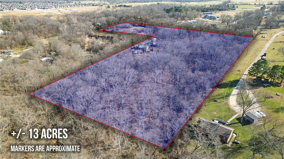 At the end of the gravel road, 10368 Johnson Hollow Road sits on 13 acres ready for your family — or your next development opportunity. Perfectly positioned near the Pea Ridge/Bentonville line, this location is close to everything we love in NWA.
Pea Ridge continues to grow, highlighted by the announcement of a new Walmart Supercenter just across Hwy 72 from the property, a nearby disc golf course, and ongoing residential and commercial development.
The 13 acres are split into two parcels — 10 acres and 3 acres — providing multiple beautiful building site options. The value is in the land, but the existing home sits on the 10-acre parcel and offers the opportunity to remodel or rent.
The home is on septic and features spring-fed water (no water or sewer bill), electric service, a large propane tank, and even a storm shelter for added peace of mind.
With continued growth in the area, this property presents potential for stunning homes on spacious lots or a place for your family to build your dream home.