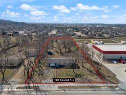 1.93 mol acres lot in the middle of commercial development. Lot is situated in a prime industrial park, ideal for constructing a city-approved commercial building.  Approximately 124 feet of street frontage and a depth of 617 feet, providing lots of space for your business with good accessibility. This is priced with no value given to any structure or house.