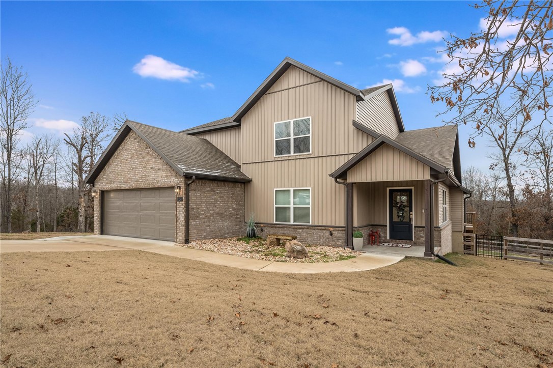 Experience luxury living in this 2022-built home, featuring 3 bedrooms and 3 bathrooms, situated in the sought after Bella Vista Area that is known for it's bike trails! Centrally located just minutes from shopping, restaurants, and schools. Enjoy sitting on your covered back deck, with all the mature trees and wildlife. This comes with additional corner lot making the lot size approximately .80! Open floor plan with custom wood beam and vaulted ceilings. Large primary bedroom with spa like bathroom. Don't forget the large bonus room!