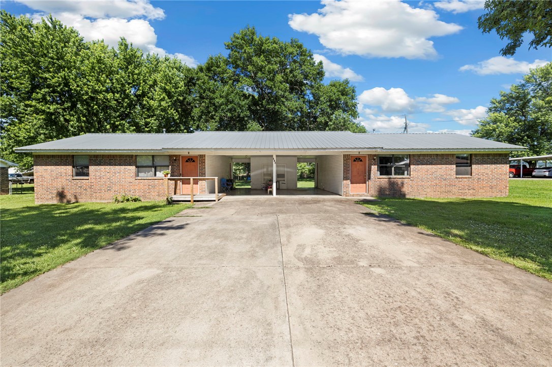 Rare opportunity for an affordable investment property in the beautiful & growing community of Prairie Grove, Arkansas! Situated on a massive .56 acre lot, the units of these duplex units  are separated by large car ports (no shared wall) for maximum privacy and each side has about a quarter acre to enjoy. Within walking distance to all the shops in the famous Downtown Prairie Grove and multiple city parks, along with groceries and gas nearby, with easy access to the highway if you have to drive somewhere, this is the PERFECT location inside of the friendliest community in all of NWA. One unit has been mostly updated, HVAC and water heater are newer and the metal roof and brick siding are a plus. Both units are in good condition, just a little love could freshen them up to your liking! 

Rare. Affordable. Opportunity. This is the one you've been waiting for, add to your portfolio or launch your real estate investment dreams today with this wonderful little duplex in Prairie Grove!