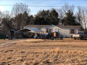 TWO Double Wide mobile homes on 17.50 fenced acres.  REPAIR & reap the benefits.  Selling ''AS-IS'', with no repairs.