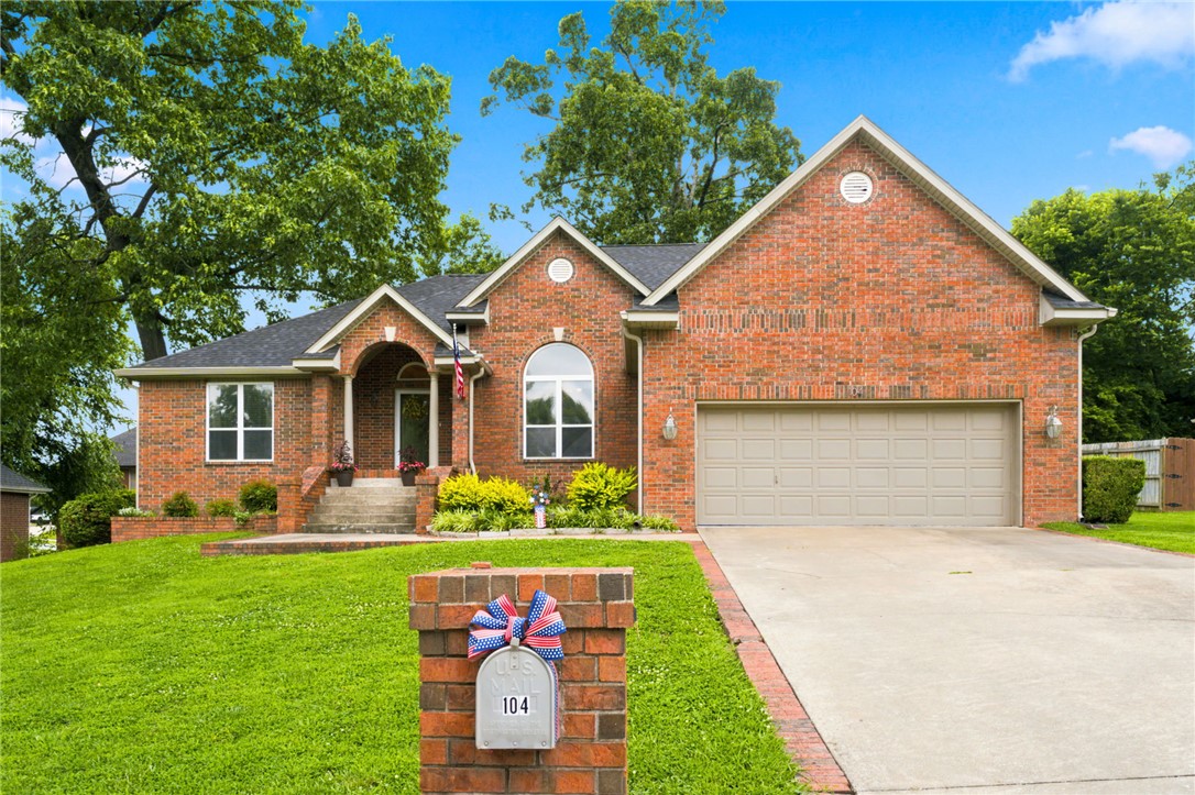 You can't beat this location. Walk or ride just a half-mile to Coler Mountain Bike Preserve and only a mile to the Bentonville Square. This brick home sits on a .28+/- acre lot with extensive recent updates. The interior features an inviting open layout highlighted by a double-sided fireplace connecting the living and dining spaces, custom tray ceilings, and new LVT flooring throughout (2024). The kitchen offers white cabinetry, an island, and smart LG appliances: gas stove and dishwasher (new in 2024), equipped with Bluetooth technology! The primary en-suite bathroom includes a warm skylight and custom tiled walk-in shower. Step outside through the beautiful dual sliding glass doors (2022) onto the large deck with stone fire pit, perfect for entertaining. Major updates include a new roof and gutters with leaf guards (2026), new HVAC with an Ecobee app thermostat (2023), and a new garage door motor with MyQ video/app control (2022). Own your piece of paradise just minutes from the Bentonville Square!