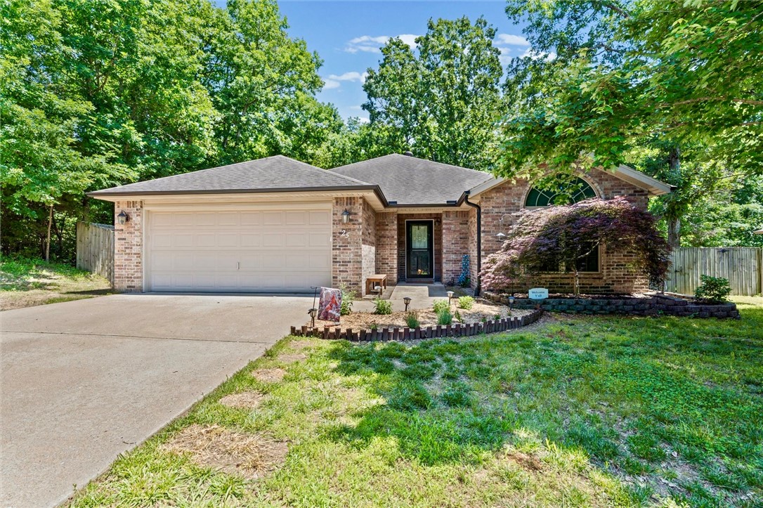 Beautifully updated and well maintained, this move-in ready bath home offers comfort, convenience, and modern upgrades. Located just ½ mile from Bella Vista Way, enjoy easy access to Bentonville, Bella Vista amenities, the new OZ Trails bike lift, and the Missouri state line. The updated kitchen is ideal for cooking and entertaining, featuring abundant counter space, ample cabinetry, new quartz countertops, sinks, faucets, and all-new appliances, including a double oven. Fresh paint, trim, carpet, and recessed lighting enhance the home’s modern feel. The living room is pre-wired for surround sound with a cozy fireplace, while the primary suite offers an updated bath with a custom walk-in shower and dual walk-in closets. A dedicated office adds flexibility for work or hobbies. Enjoy the covered patio overlooking a flat, fenced backyard with beautiful landscaping, perfect for entertaining. Additional updates include a Bradford White water heater, gutters with guards, downspouts, and garage door motor and belt.