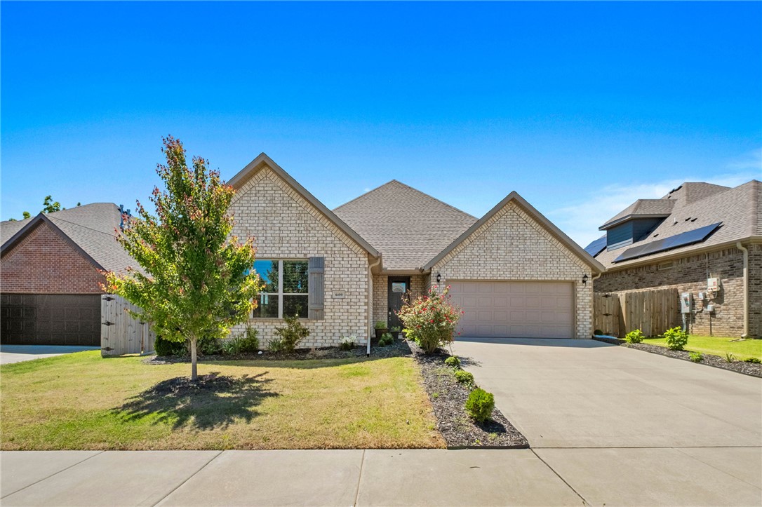 Welcome to this beautiful, east-facing 3Br, 2.5Ba home offering the perfect blend of modern luxury and comfort. Built in 2022, the home features a bright, open-concept floor plan designed for joyous daily living and entertaining. The spacious great room impresses with vaulted ceilings, exposed wooden beam, & a cozy gas-log fireplace, all flooded with natural light. At the heart of the home is a cordial kitchen complete with a large island, granite countertops, and stainless steel appliances. The main-floor primary suite serves as a private retreat, featuring a generous walk-in closet and an upscale ensuite bath with a large walk-in shower. A convenient powder room is also located on the main level for guests. Upstairs, you will find two spacious bedrooms connected by a functional Jack & Jill bathroom. Step outside to a large covered back patio and a fully privacy-fenced backyard, ideal for outdoor living. With standout curb appeal and splendid finishes throughout, this property is truly a great place to call home.