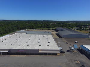 110,000+/- sqft commercial buildings spreading out over an 8 acre lot. Lying in the center of Russellville's major retail and industry side of town is a vanilla box of endless possibilities. Located between 2 high volume traffic areas.  Former location to Wal Mart and National Home Center.
