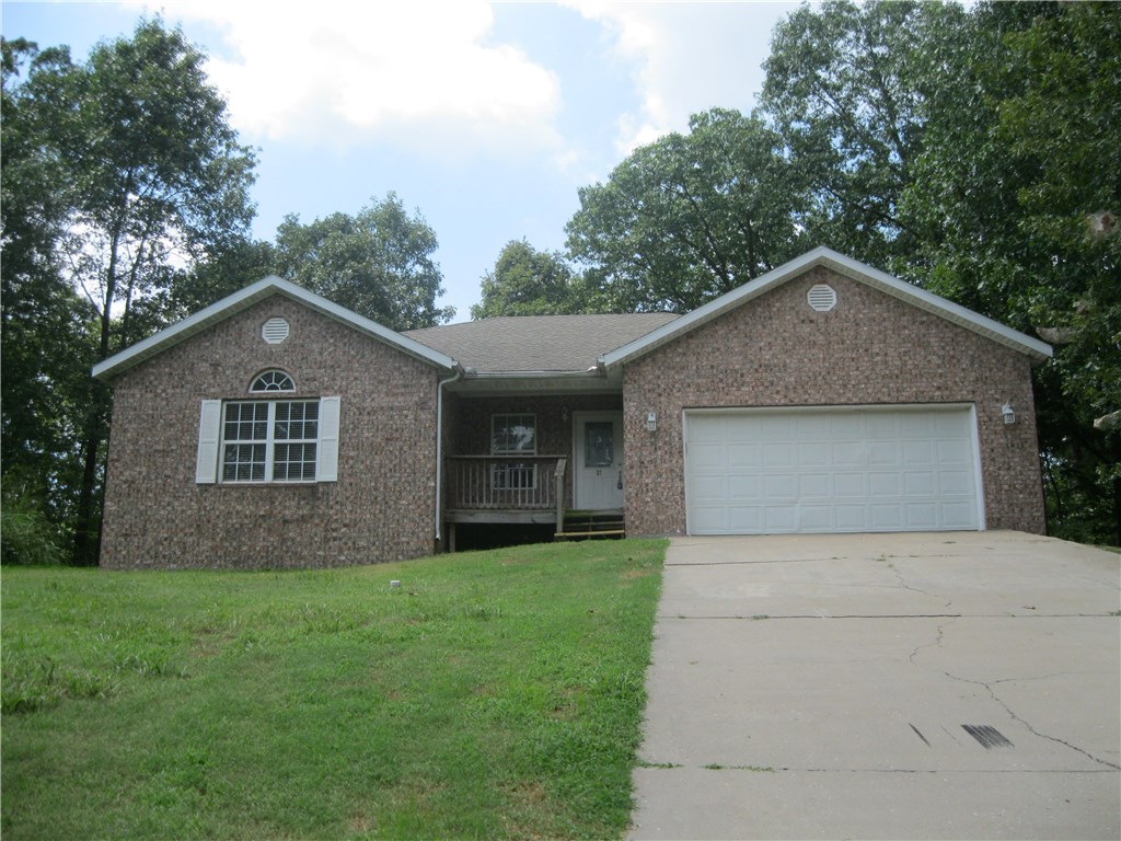 Beautiful updated home featuring 3 bedrooms, 2 full baths. New paint, tile in entry and kitchen. Gas log fireplace, 2 car garage. Enjoy the privacy overlooking wooded area in back.