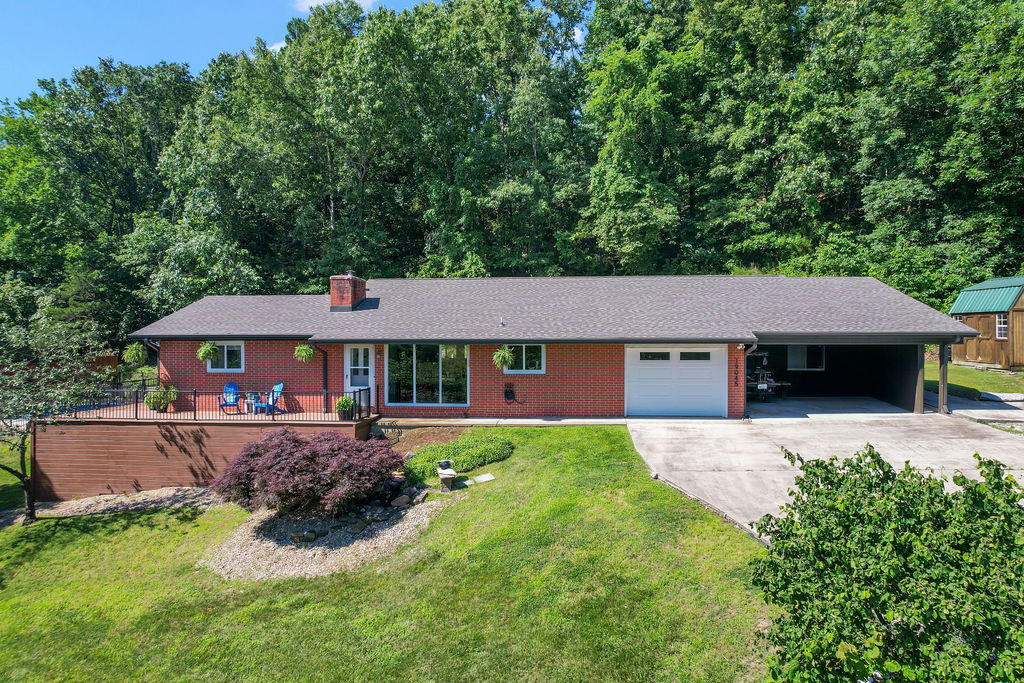 Welcome to your own private oasis, just 20 mins east of Downtown Rogers. Situated on a spacious 0.80-acre lot, this beautifully remodeled 3-bedroom, 2-bath home combines modern updates w/peaceful lake-area living. Step inside to discover a completely renovated interior featuring Samsung Bespoke Appliances, engineered hardwood floors, & lots of updated finishes. The spacious master suite features a large en-suite bathroom complete w/a relaxing soaker tub, walk-in shower, & dual walk-in closets. Large windows bring in natural light while showcasing seasonal views of Beaver Lake! Enjoy summer days in the in-ground heated swimming pool, relax year-round in the hot tub, & take advantage of the large composite deck, screened in patio, & generous outdoor space. A 10x12 shed, & 10x13 storage/shop area give you extra room for storage. 30 Year impact resistant fiberglass shingles were installed a couple years & the pool is serviced weekly! A community boat launch is 3 mins away & the Rocky Branch Marina is only 10 mins away!