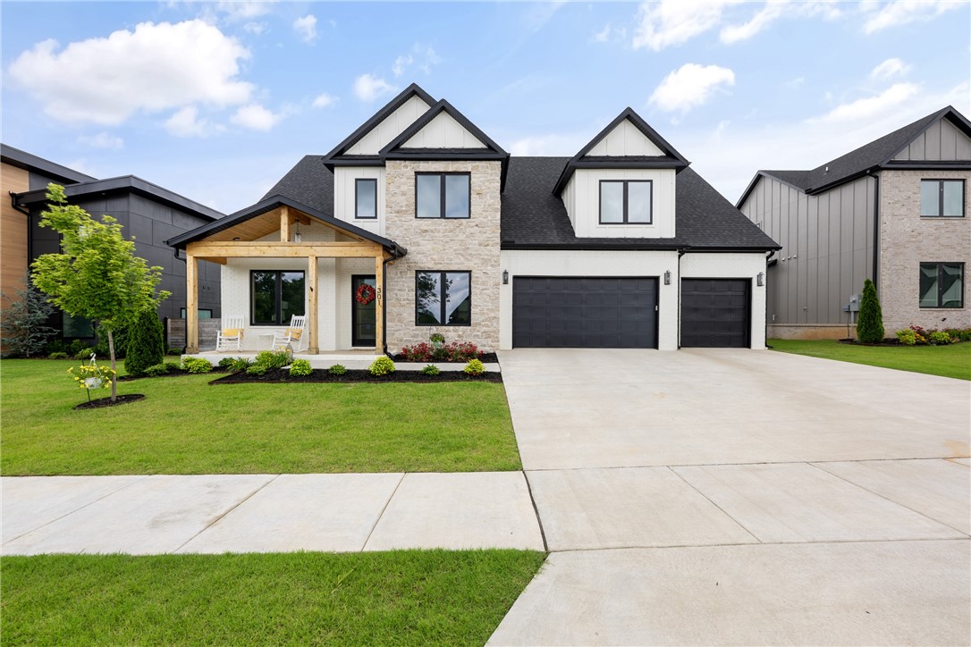 This newer developed community of Autumn Hill is just 3.5 miles to the Square. This home is only a year old and very well cared for. Very spacious, open floor plan. Wired for sound and security. In-house fire suppression system. Tankless water heater. Main level features an open kitchen with quartz island and counters, pantry, coffee bar, and commercial style refrgerator. A open living area connects to the covered patio. There are two additional flex rooms that could be used as a first floor second bedroom, study, craft room or formal dining. Master Ensuite with soaker tub, custom tiled shower, and a private patio. Second floor landing is open to below and leads you to bedrooms 3, 4 and 5 plus two full baths, a Bonus room, and tons of attic space. Three car garage. Landscaped and sodded. 9 min from HO. This home has it all!