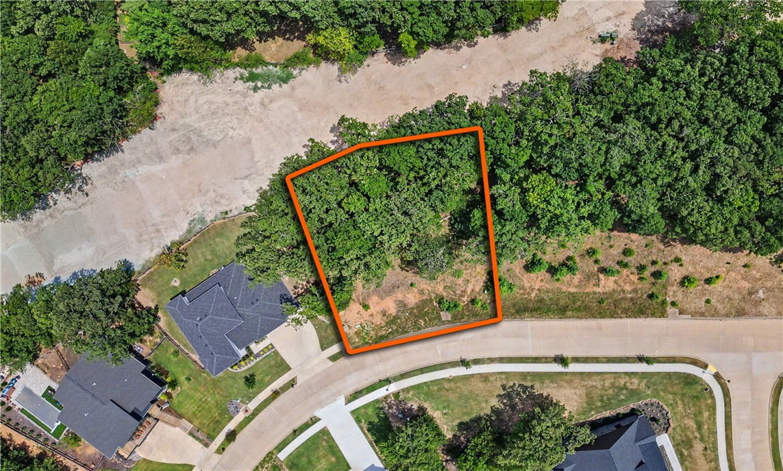 Here's your chance to build something special in one of Fayetteville's most sought-after neighborhoods—Summit Place. Tucked just off Township in the heart of Northwest Arkansas, this upscale homesite offers the convenience of being just minutes from everything that makes Fayetteville one of the state's most desirable places to call home. With public water and sewer available at the street, you're one step closer to turning your dream home into reality. Enjoy the energy of downtown Fayetteville, Razorback athletics, local restaurants, shopping, and the endless trails that make Northwest Arkansas so special. The University of Arkansas, medical facilities, entertainment, and everyday conveniences are all just minutes away. Whether you're ready to build now or planning for the future, this is a well-located homesite in one of Fayetteville's most established and desired areas.