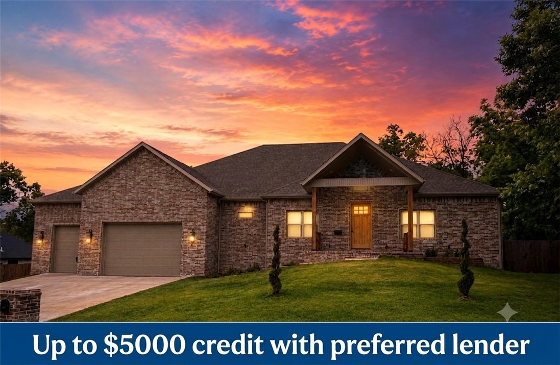 Tucked beneath mature trees on over an acre in Rogers, this private modern retreat offers a rare blend of luxury, warmth, and natural seclusion just minutes from Northwest Arkansas amenities. Unlike typical new construction estates focused on specifications, this home emphasizes a true lifestyle experience within nearly 5,000 square feet of thoughtfully designed living. Soaring vaulted ceilings, abundant natural light, and warm organic finishes define the open-concept main level. The chef’s kitchen features custom white oak cabinetry, premium appliances, and an oversized quartz island designed for gathering. The main-level primary suite provides a spa-like escape, while flexible spaces support guests, office, fitness, or multigenerational living. A lower-level lounge and media retreat enhance entertaining potential. Outdoors, mature trees, a cedar-fenced yard, and expansive living areas create unmatched privacy, with room for a pool, garden, and outdoor kitchen.