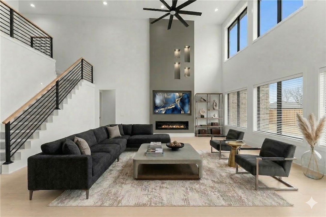 Discover the pinnacle of sophisticated living in this masterpiece, where grand proportions meet bespoke finishes. The breathtaking great room flooded in light commands attention with soaring two-story ceilings, a sleek linear fireplace, and premium LVP flooring that flows seamlessly throughout the main level. Culinary enthusiasts will marvel at the gourmet kitchen, adorned with quartz counters and backsplash, professional-grade Cafe appliances, soft close custom cabinets to the ceiling, 5 burner gas range, convection microwave, and butler’s pantry. Designed for ultimate privacy, each bedroom is a curated sanctuary featuring its own en-suite bath. The primary retreat features modern accent wall, beautiful lighting and an opulent spa experience with a soaking tub, walk in tile shower, and direct laundry access from the walk in closet. From the executive study with its designer chandelier and built ins to the elevated loft and bonus room with elegant dry bars—every inch of this is engineered for an elite lifestyle.