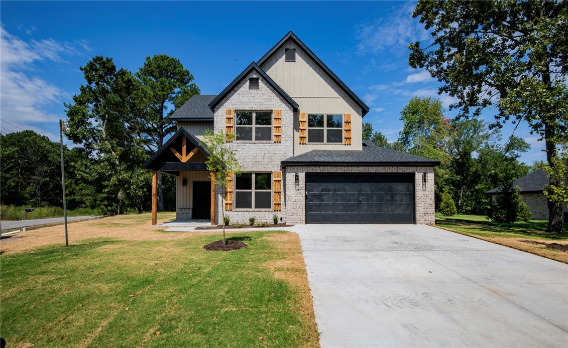 New construction Bella Vista home!  3 bed + Office/2.5 bath home on flat corner lot near The Highlands golf course, Branchwood Recreation Center, Lake Loch Lomond, with easy access to I-49 Bella Vista Bypass.  Open concept/split bedroom floorplan boasts lots of natural light. High end finishes featuring hardwood floors in entry, living and master areas. Vaulted ceiling in living room, kitchen, dining area, stainless steel appliances, gas log fireplace, granite countertops, walk-in pantry, and large island.  Large storage closet on main floor and walk-in/floored attic access.  Spacious master suite features a large walk-in closet, double vanity, walk-in custom shower, and freestanding tub. Home is plumbed for a generator and covered patio for outside entertaining. Preferred lender offering $5,000 in closing costs paid. Builder offering $5,000 in concessions.