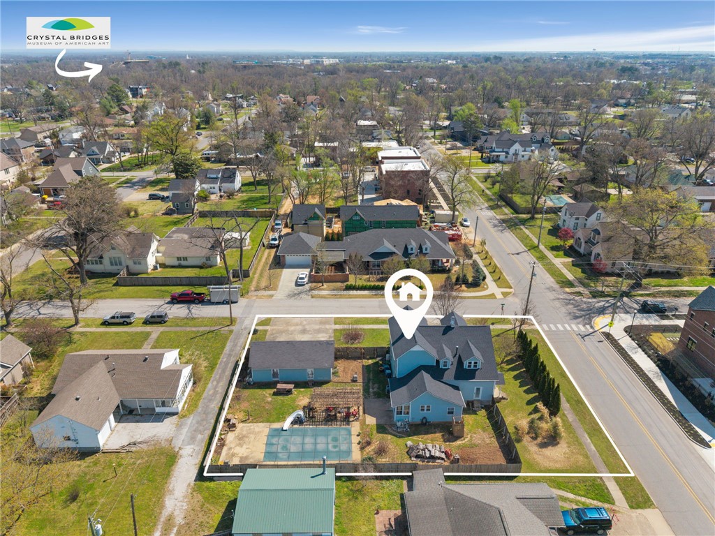 One of the few remaining large-scale corners in the Downtown Bentonville grid. This .33-acre lot in the NW quadrant is a prime candidate for high-density development or a flagship estate just blocks from the Square.  Minutes to Crystal Bridges Museum, The Momentary, and the upcoming Alice L. Walton School of Medicine.  Immediate "bike-in/bike-out" access to the Slaughter Pen and All-American trail systems.  Steps from the heart of the Downtown Square.