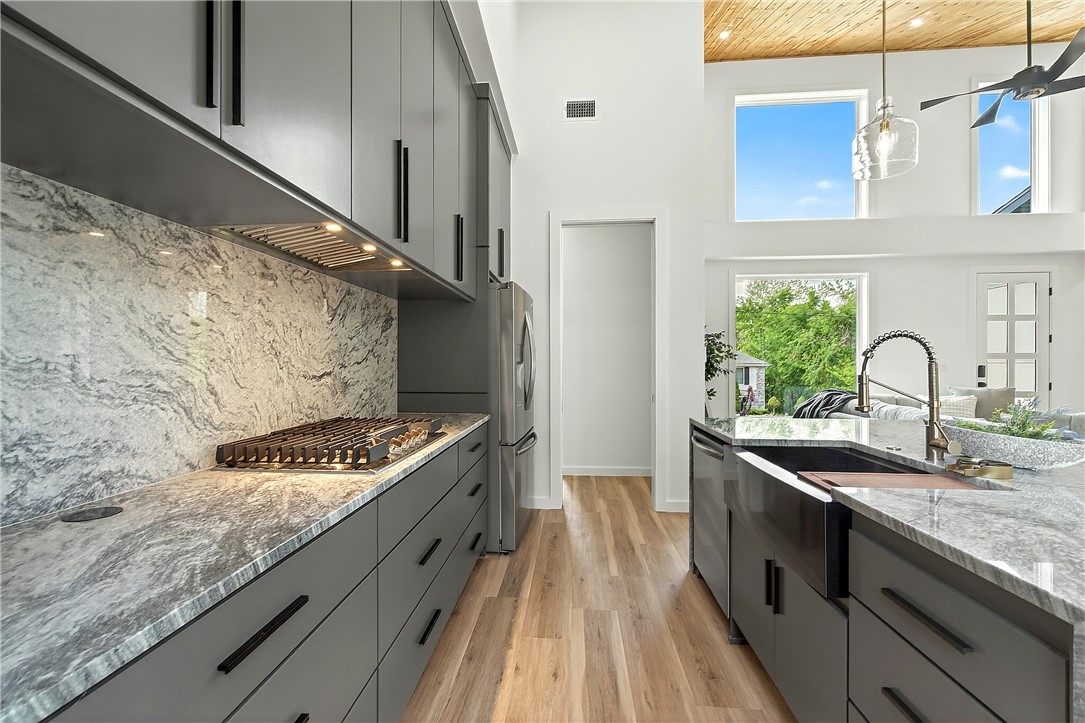 $10,000 credit towards closing costs & $5,000 seller's credit. 2026 New construction! This 3-bedroom, 2.5-bath home blends modern luxury with high-end upgrades rarely found in comparable new construction. Features include a custom fireplace surround, fully stained fencing with lights, sod, and a 2-car garage with epoxy flooring. The kitchen is equipped with a marble waterfall island, upgraded marble backsplash, refrigerator, and a cup rinse. The primary suite offers a walk-in closet and spa-inspired walk-in shower, plus a sitting area. Upgraded laundry room includes washer and dryer, custom shelving, and sink. Located less than .5 miles from Scottsdale Golf Course, and minutes from Lake Loch Lomond. Over $42,000 in documented upgrades beyond standard builder specifications support this home’s elevated quality, design, and value. This lot is and will be deeded as a 2-bed septic, and acknowledgement of this must be submitted in offers. 3rd room to be considered an office or other non-sleeping room.