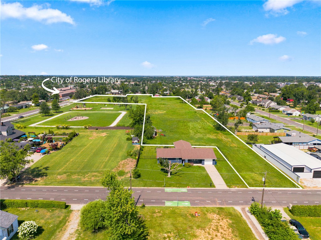 5.88 Acres zoned T4.2 in Rogers. T4.2 Zoning allows high intensity residential. Located adjacent to Rogers Library Park and across Pine St from the Rogers Public Library. Water and Sewer available. Access to W Pine St., S 15th St and W Cypress St. Excellent infill development opportunity close to city amenities. Seller can provide engineering/plans on request.