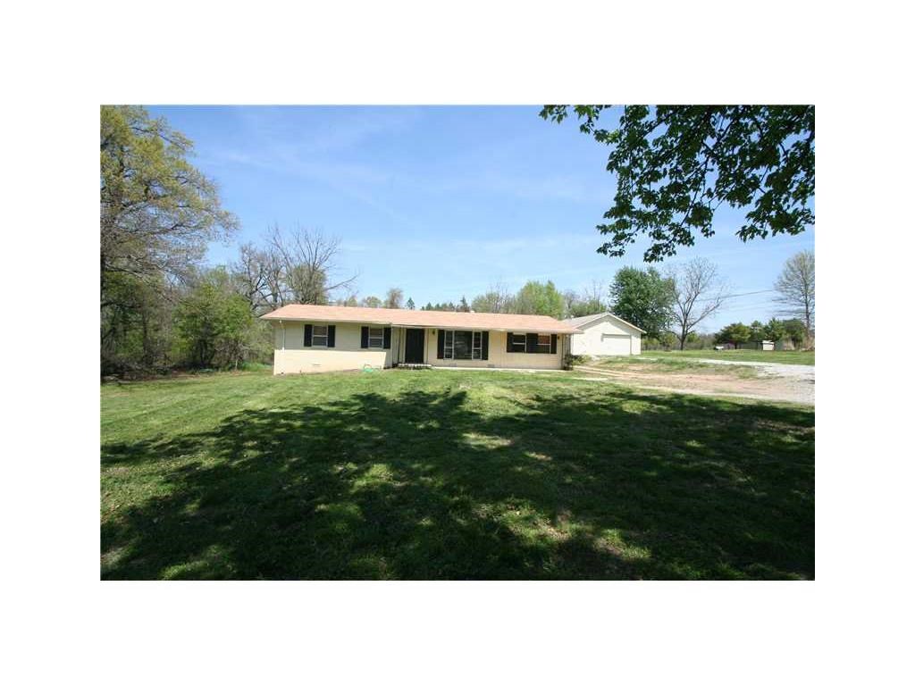 1.5 acres with this home that has 3 bedrooms and 1 1/2 baths. detached garage. convenient located just down the street from the promenade mall. Sunroom can be extra living or play room.