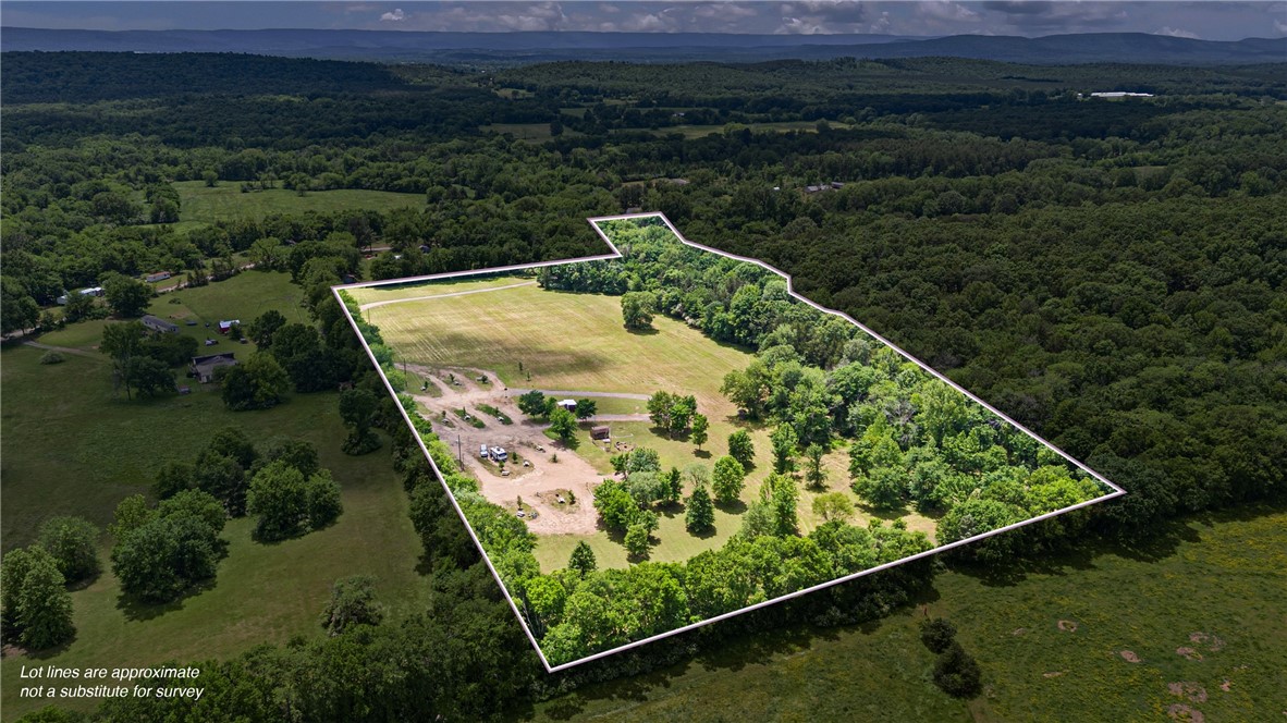 Whispering Springs is a fully operational and turnkey RV campground nestled on over 15 scenic acres in the heart of Yell County. This rare investment opportunity offers a unique blend of nature and modern convenience, perfect for outdoor enthusiasts or those looking to expand into the hospitality market. Surrounded by nature and just minutes from Spring Lake and the Ozark National Forest, guests can enjoy endless recreational opportunities like fishing, boating, canoeing and trail riding. The nearby boat ramp is open and easily accessible. 
*11 spacious RV campsites with full 30&50 amp hookups
*Pull through sites for easy access 
*Private bath house with 2 showers and 2 restrooms 
*On site RV dump station
*Fully furnished main cabin with upstairs lofts, kitchen, bathroom, TV and mini split HVAC
*Mini Cabin with bed, living area, kitchen, TV and Air cond.
*City water and backup well
*Reliable WiFi
*Daily Parking for SxS, horse trailers,and more
*Whispering Springs is ready to go- just bring your vision!