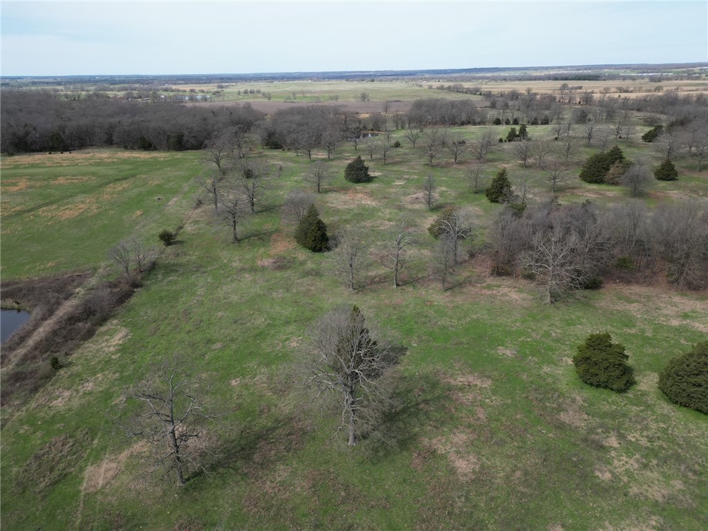 This 6.80 Acre property is nestled in a serene rural area, offering a perfect blend of open space and wooded areas. With its abundant greenery and ample grazing opportunities, this property is ideal for a small cattle farm. Located in a peaceful rural setting, the property benefits from easy access to public water, with a convenient water source available at the road. Whether you're looking to build your dream home, start a small farm, or simply enjoy the serenity of nature, this 6.80acres parcel offers endless possibilities. Please note: The chicken farm across the road is no longer in operation.