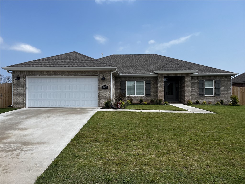 Beautiful all brick rental home  in the heart of NWA! Home features a spacious open layout, large kitchen island, low-e windows, granite counter tops, hardwood floors, stainless steel appliances and so much more!