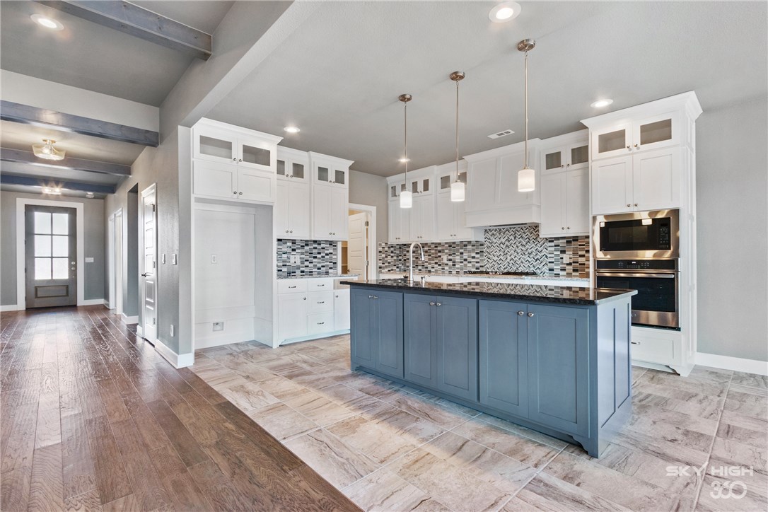 Welcome To Your Next Home! Fantastic New Construction In West Bentonville's Rolling Acres Subdivision Featuring A Community Playground & Pool. Great Open Floorplan Featuring 4 Bedrooms & 3 Full Baths. Master Suite + One Bed Down; 2 Beds + Full Bath Up. Beautiful Kitchen w/ Painted Cabinets, Granite Counters (and throughout), Island w/ Bar Seating,  Large Eat-in Dining. Laundry/utility w/ Passthrough Into Master Closet. Covered Back Patio. With So Much To Offer, Make Sure This One Is On Your List.