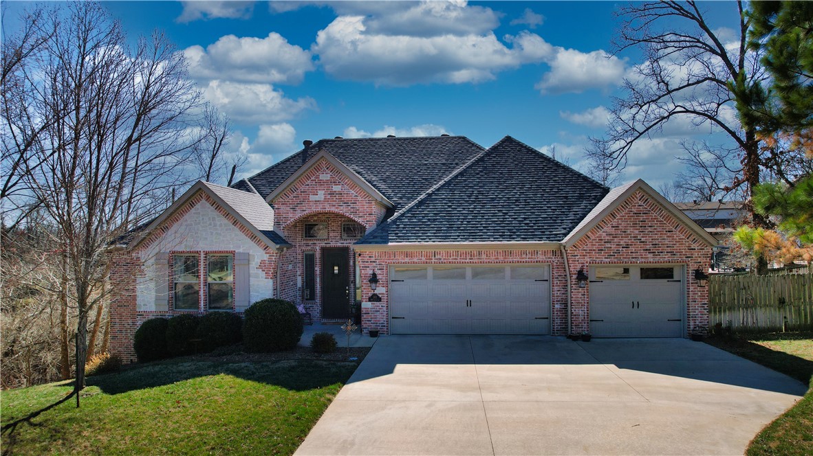 Location, Lifestyle, and Space—this 4-bedroom, 3.5-bath home offers 3,474 SF in a setting that’s hard to match. Tucked in a quiet cul-de-sac of only two homes, you’ll enjoy privacy and only 2 miles from downtown Bentonville and 2.5 miles to Crystal Bridges. With direct access to hundreds of miles of world-class mountain bike trails and the Razorback Greenway, outdoor adventure starts at your doorstep. Quick access to I-49 makes commuting easy. Inside, you’ll find expansive living areas, a very spacious Primary Suite, and a 3-car garage for ample storage. The large fenced backyard provides room to relax or entertain. All appliances convey, making this home truly move-in ready.