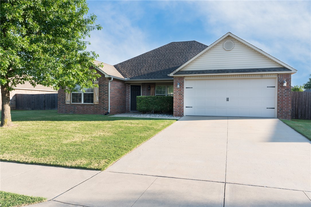 Just listed! (Remaining pictures will be updated on Friday) This competitively priced, beautifully maintained 4-bedroom, 2-bath home is a fantastic opportunity for first-time homebuyers or investors. Walking distance to Centerton's Gamble Elementary school and Bentonville West High School. The inviting open-concept layout features a spacious living room with vaulted ceilings, perfectly complementing the highly desirable split-floor plan. Retreat to the large primary suite or enjoy the seamless flow of luxury vinyl plank (LVP) flooring throughout, with durable tile in the kitchen and bathrooms. Outside, relax on the covered front porch or the back patio overlooking a generous, fully fenced backyard. The exterior boasts low-maintenance brick on three sides with vinyl siding on the rear. Notable updates include a newer roof (3 years old) and a newer water heater (2 years old), Tiled shower. HVAC is original. Showings begin Friday, July 10.