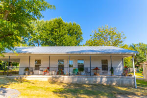Experience one of the newer homes in Harrison that boasts a 3 bd/2ba, open floor plan with a beautiful gas fireplace and hot water on demand throughout the house. The flooring is a laminate style with a wood grain look and you can spend cool evenings on the covered front porch overlooking the front lawn that has been restored with freshly cut sod.
